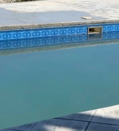 Cracked concrete pool deck in need of repair